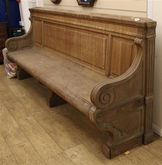 A 19th century Continental oak settle W.approx. 255cm